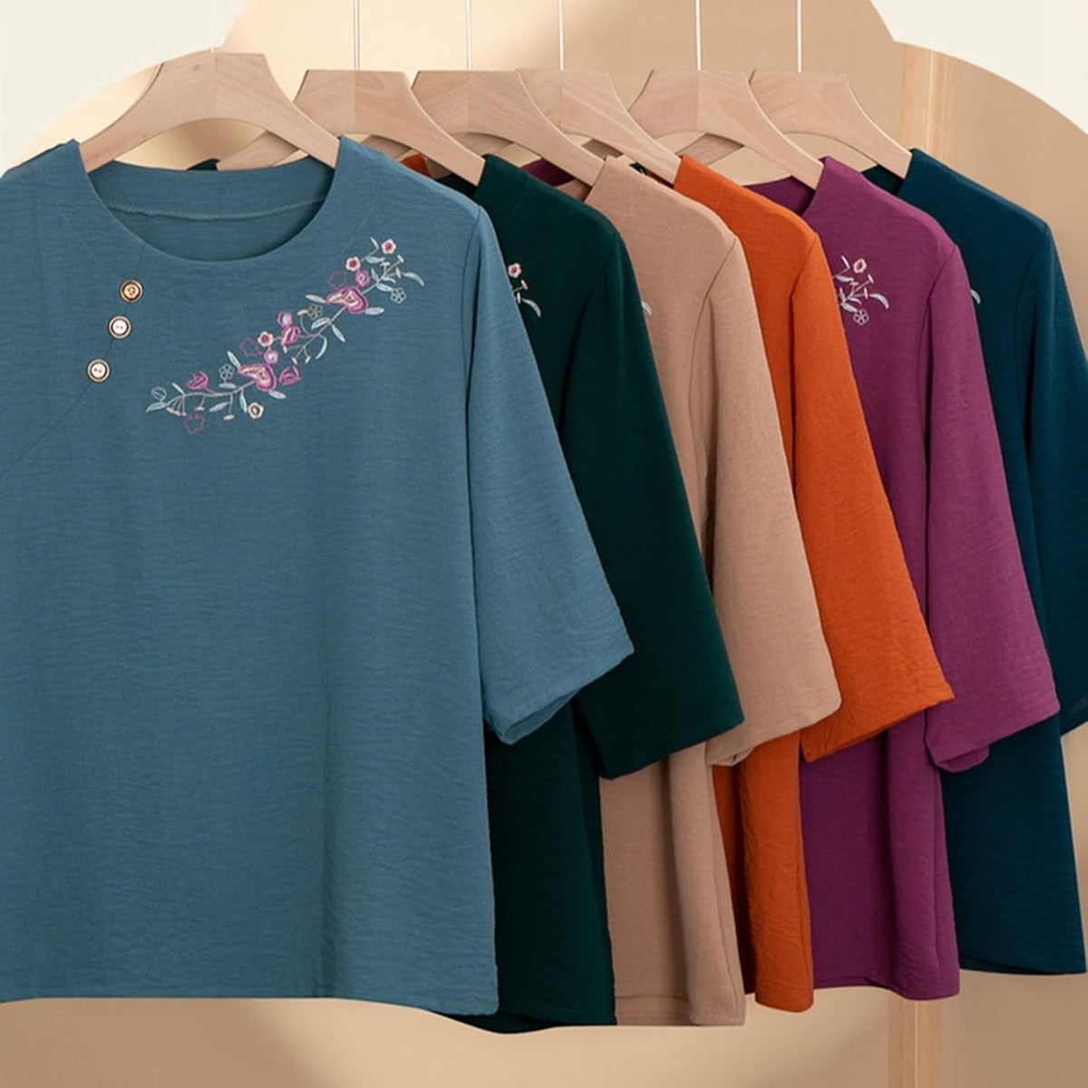 Embroidered mid-sleeve top